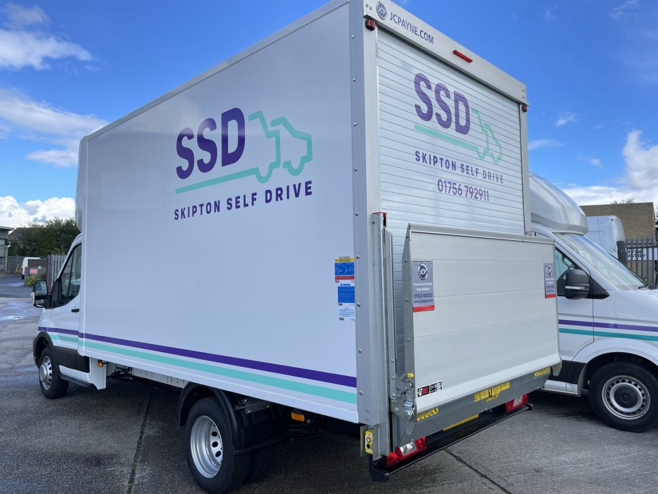 Van with shop tail lift